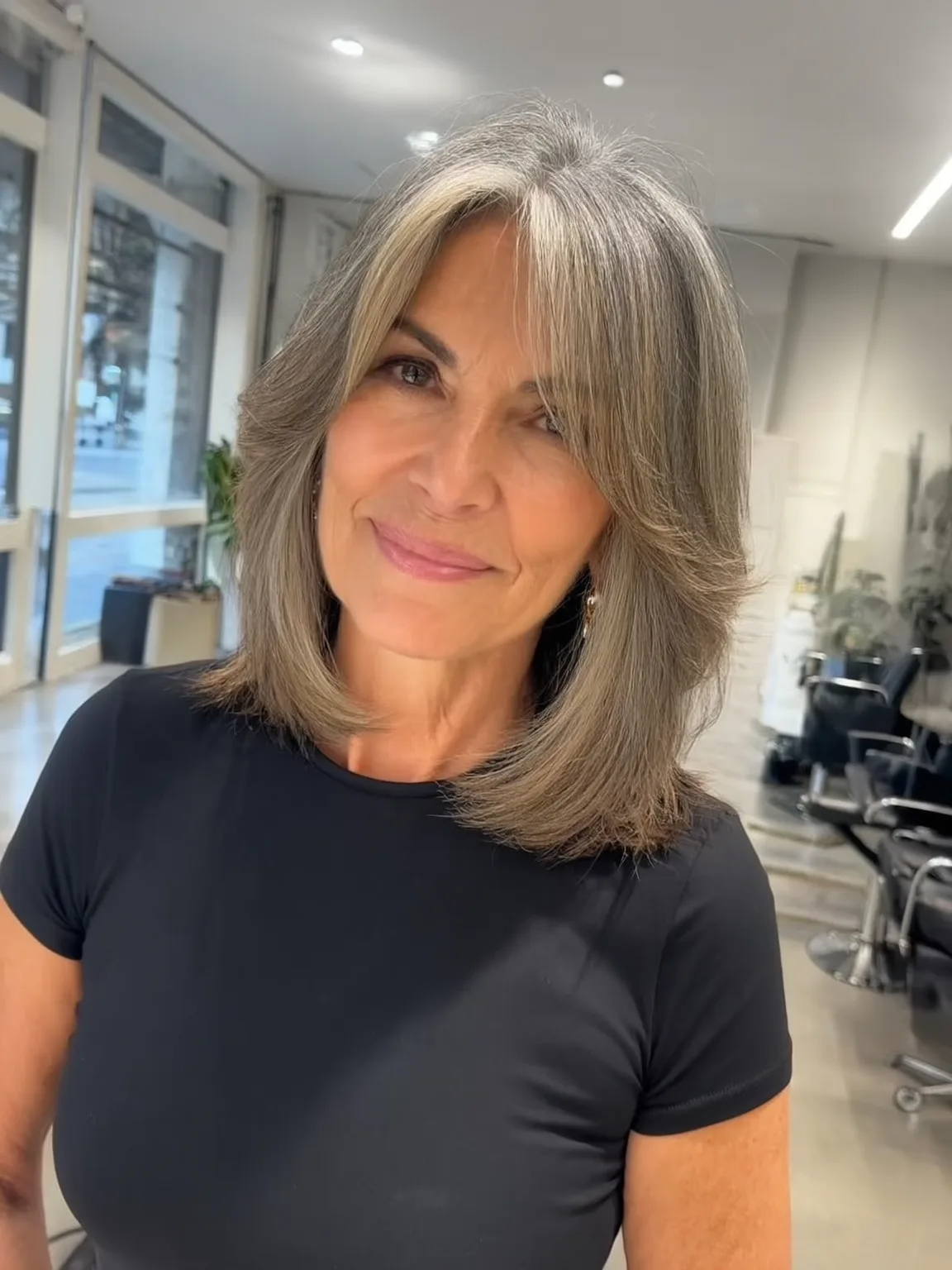 Silver Gray Layered Shoulder-Length Hair with Curtain Bangs