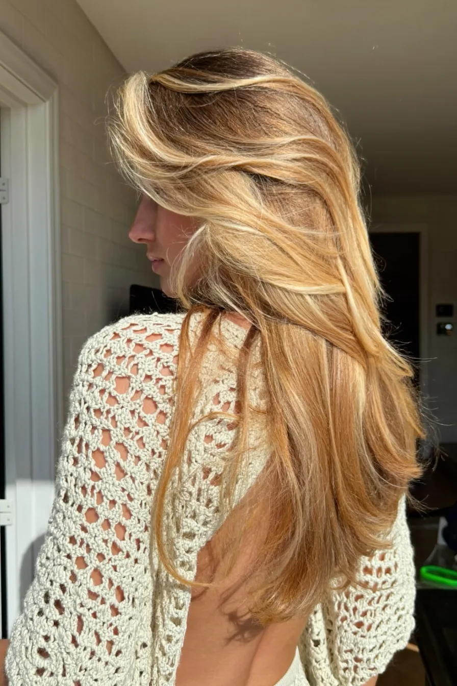 Sunkissed Balayage Blonde Wavy Long Layered Haircut with Face-Framing Volume
