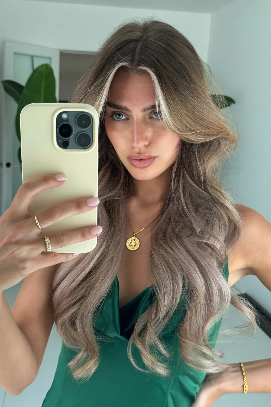 Balayage Blonde Wavy Long Layered Haircut with Face-Framing Highlights