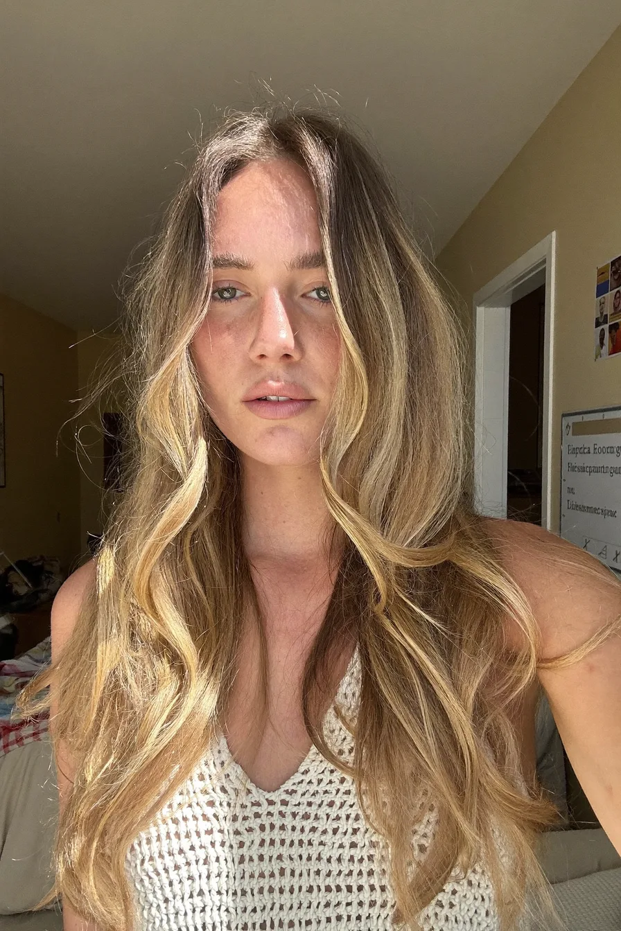 Lived-In Wavy Balayage Blonde with Flowing Long Layers