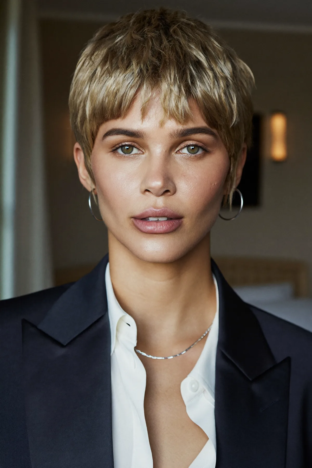 Sleek Straight Dark Blonde Pixie Cut with Full Fringe Bangs