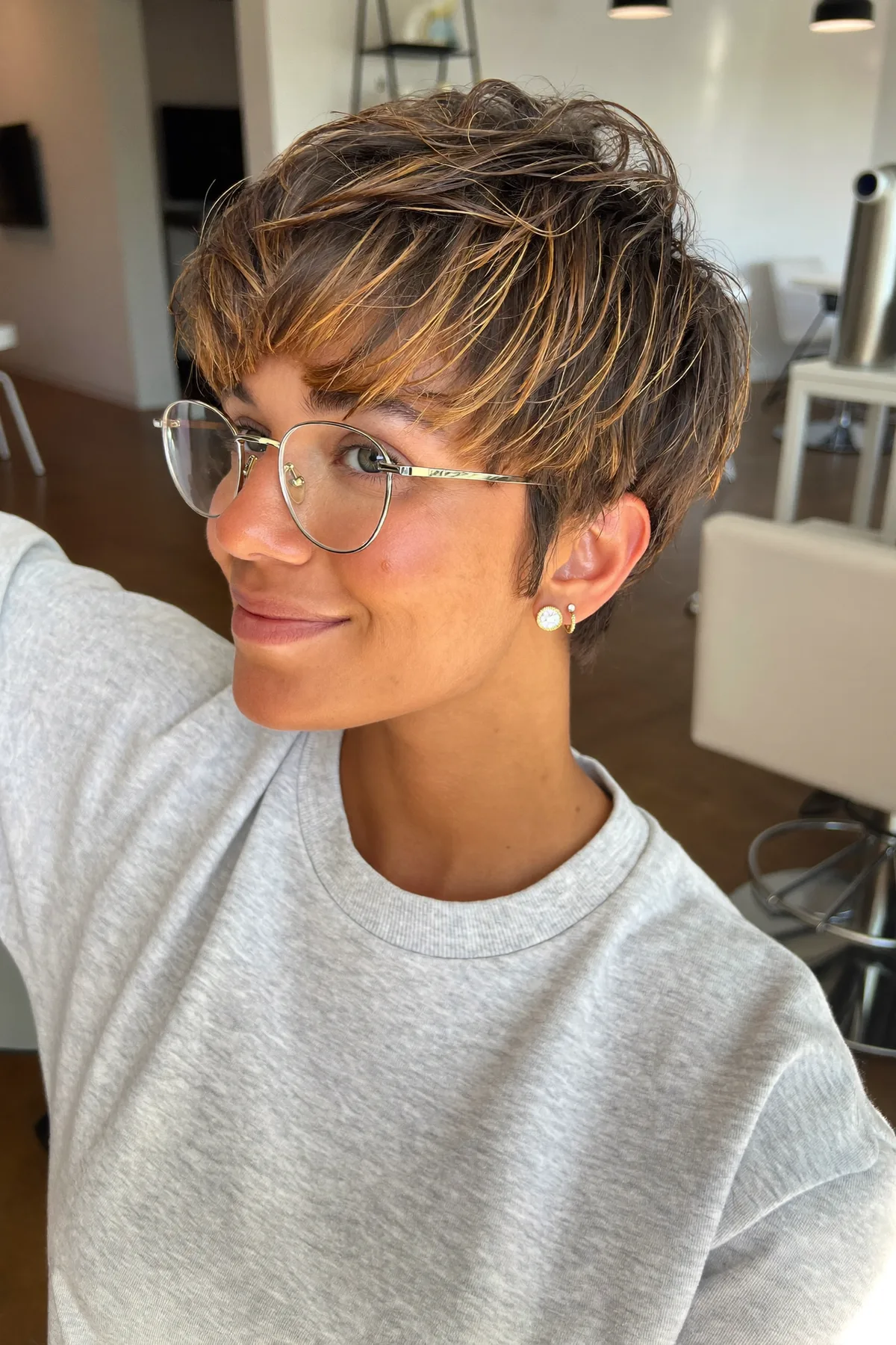 Dark Blonde Wavy Pixie Cut with Full Fringe and Balayage