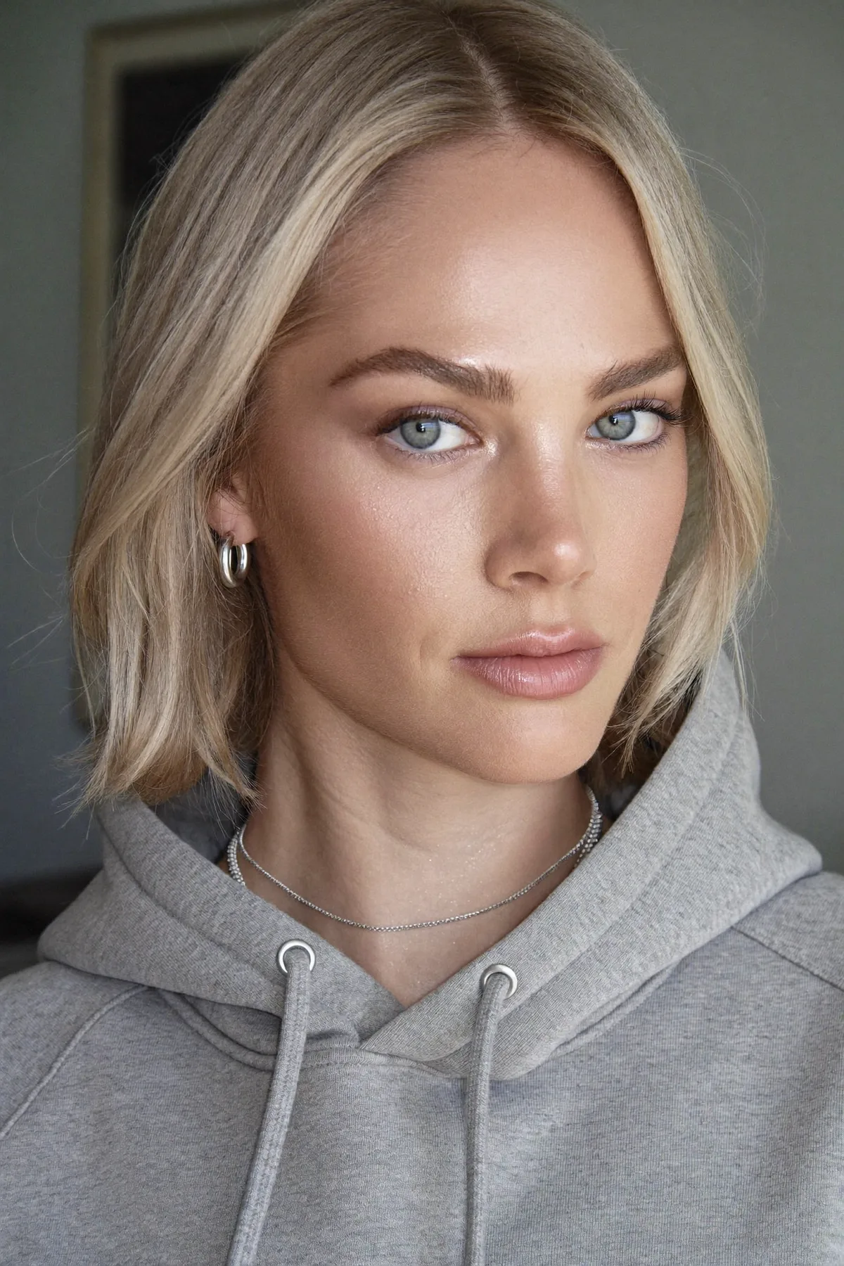 Sleek Straight Dark Blonde Chin-Length Bob with Solid Color