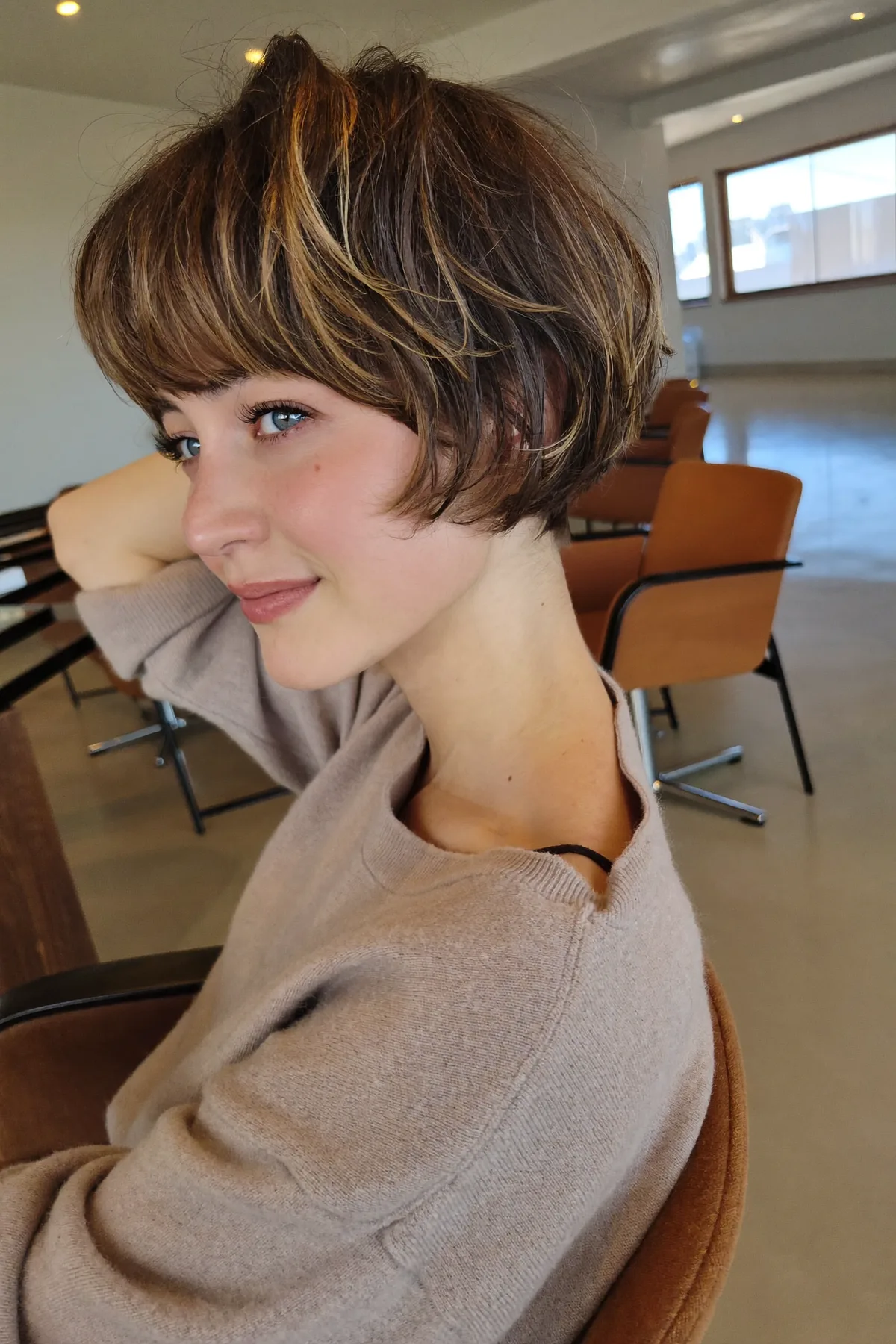 Chin-Length Dark Blonde Bob with Wavy Texture and Full Fringe
