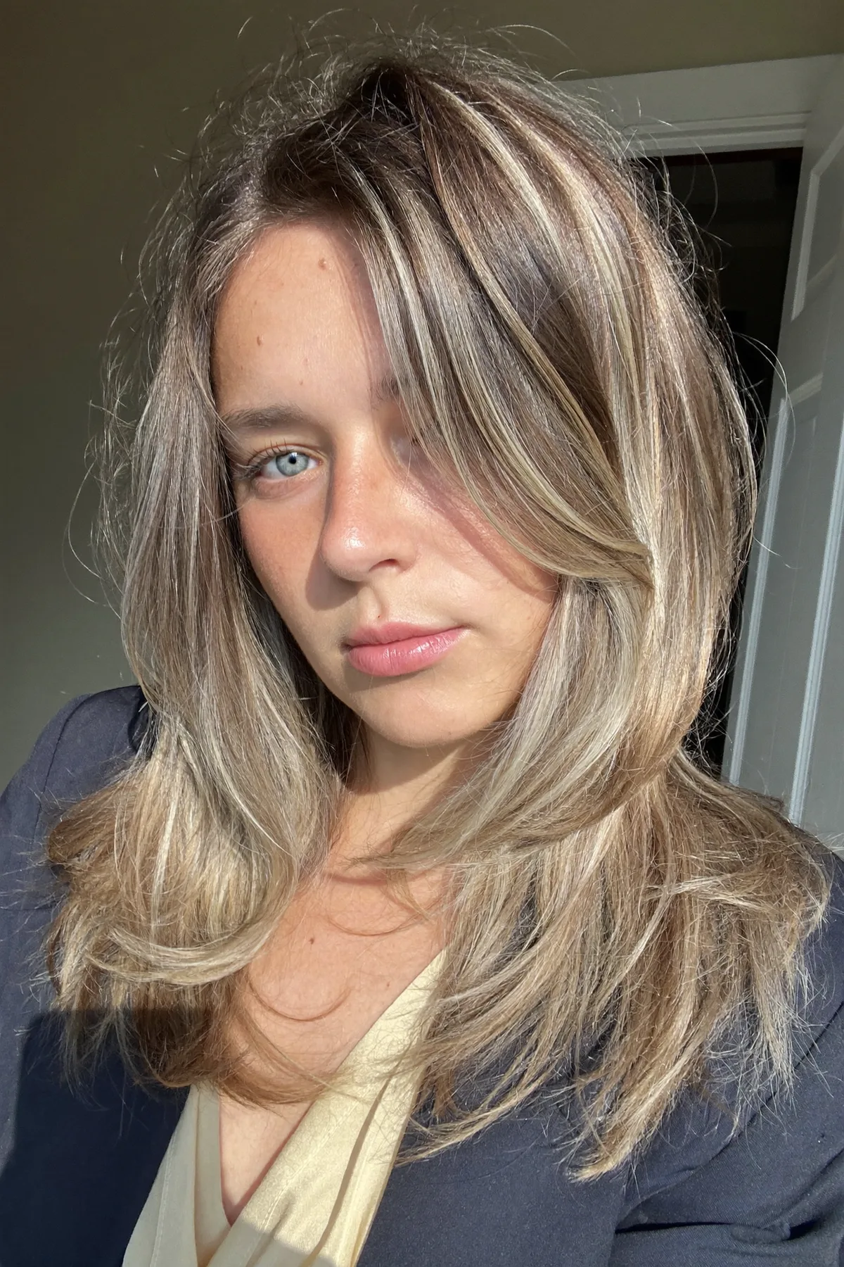 Sleek Straight Dark Blonde Lob with Curtain Bangs and Balayage