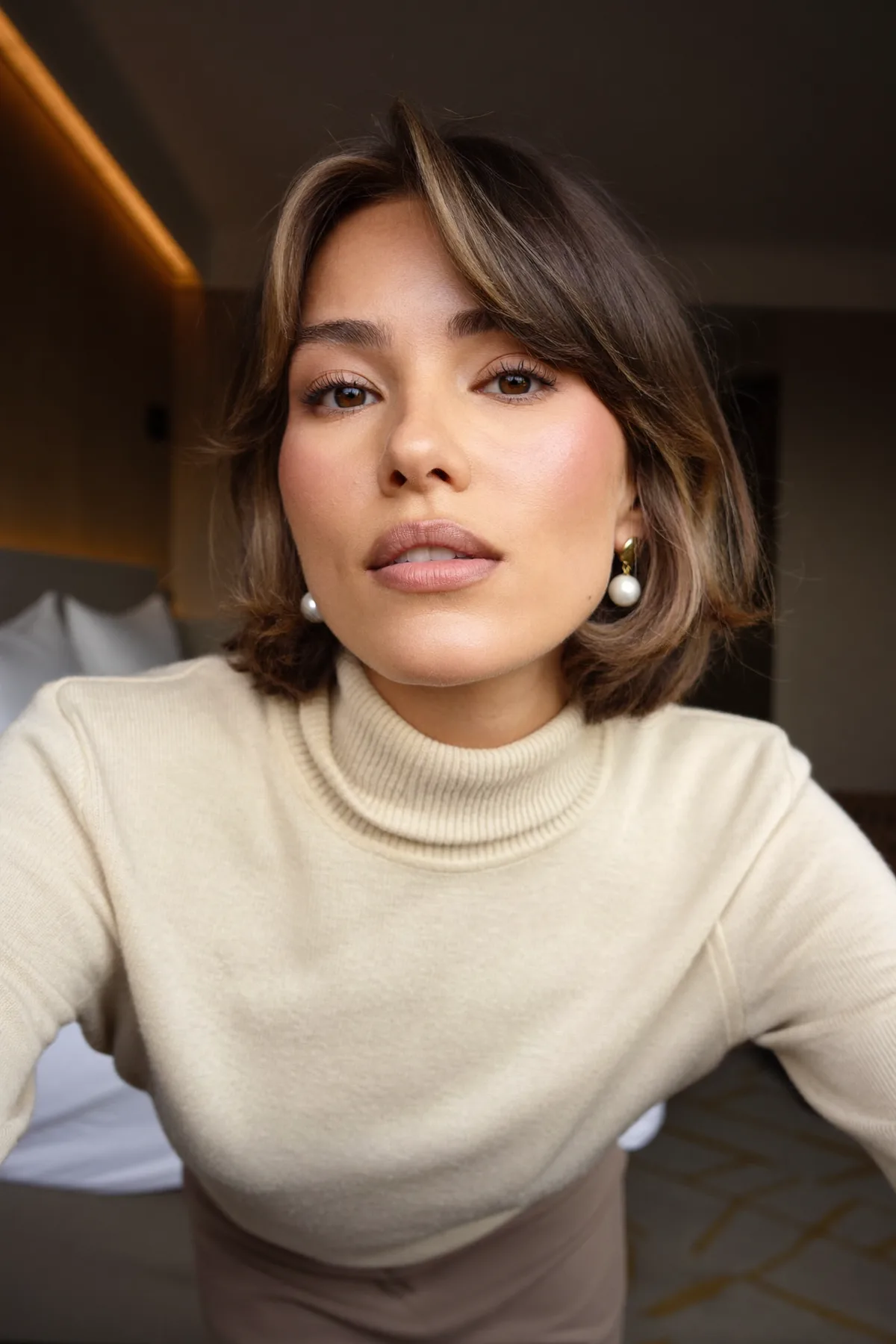 Sleek Straight Dark Blonde Bob with Curtain Bangs and Money-Piece Melt