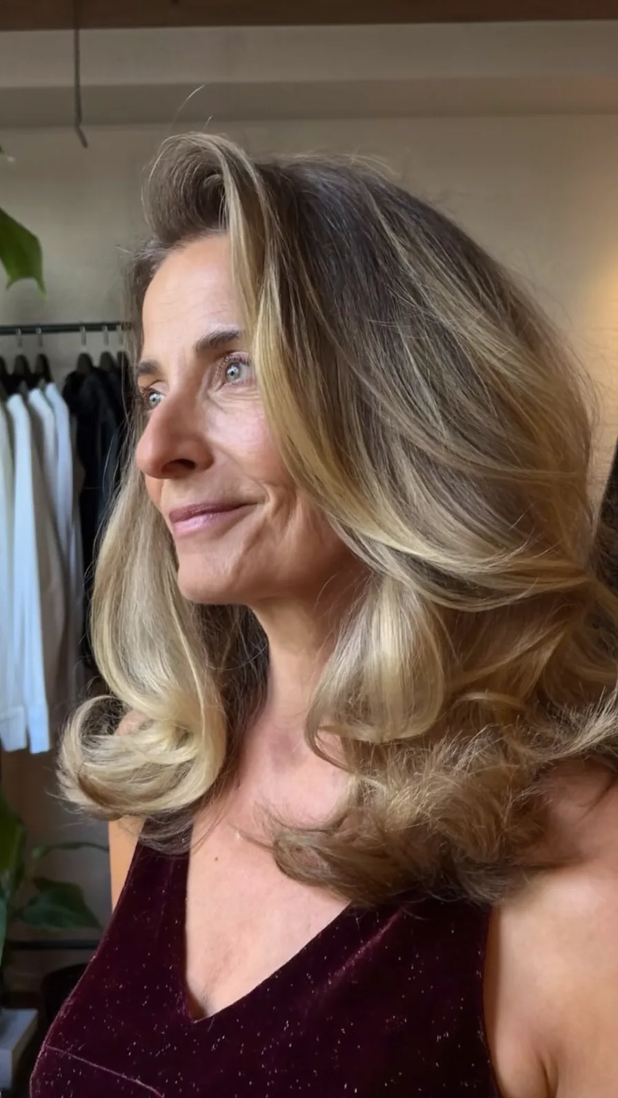 Voluminous Layered Blowout with Warm Honey Blonde Balayage