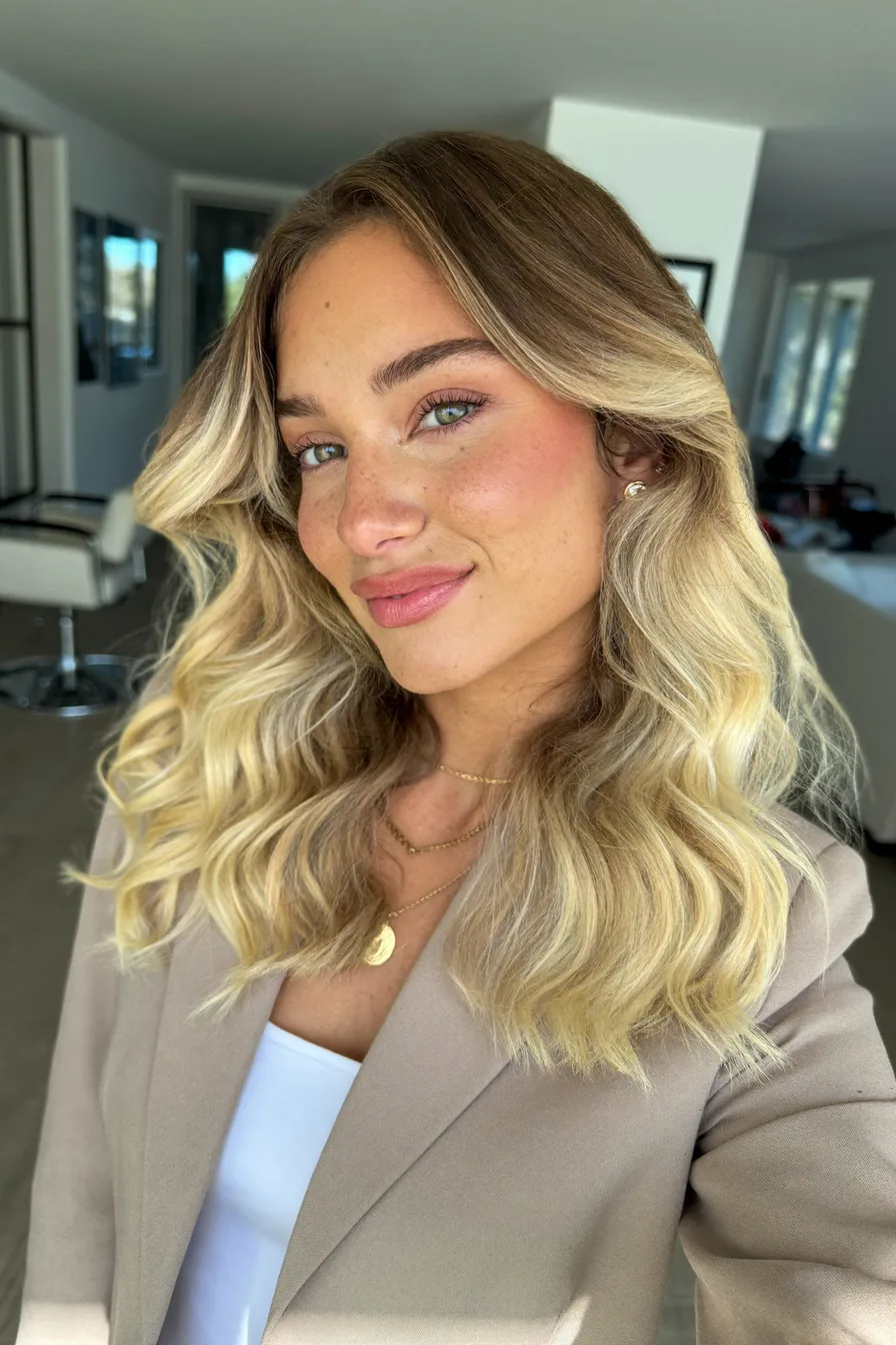 Medium Length Wavy Balayage Hair with Curtain Bangs