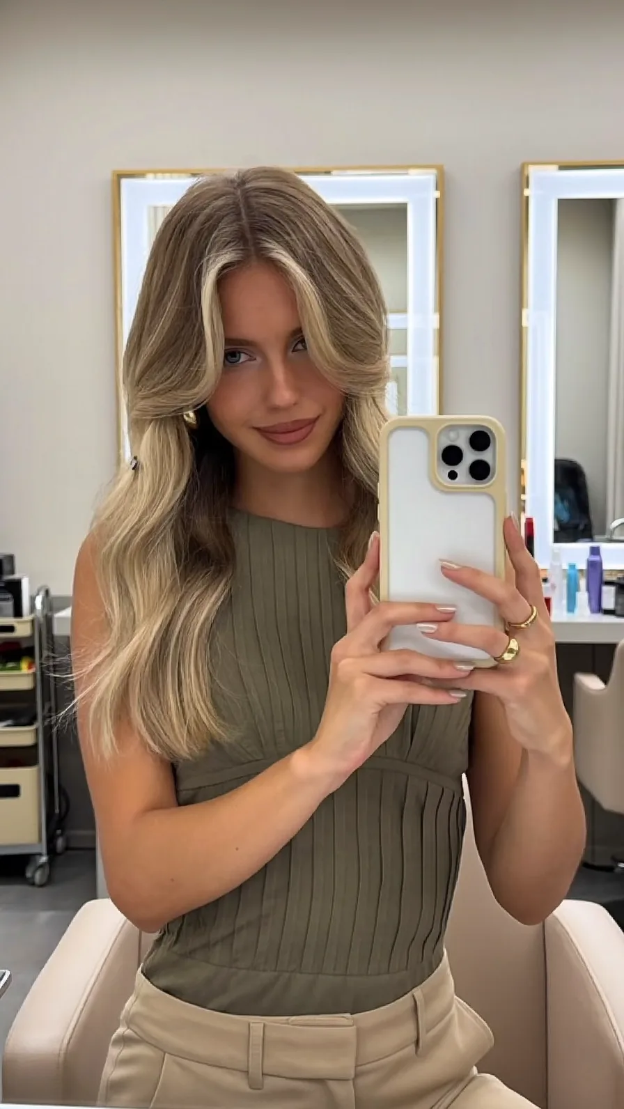 Long Layered Waves with Curtain Bangs and Balayage Highlights