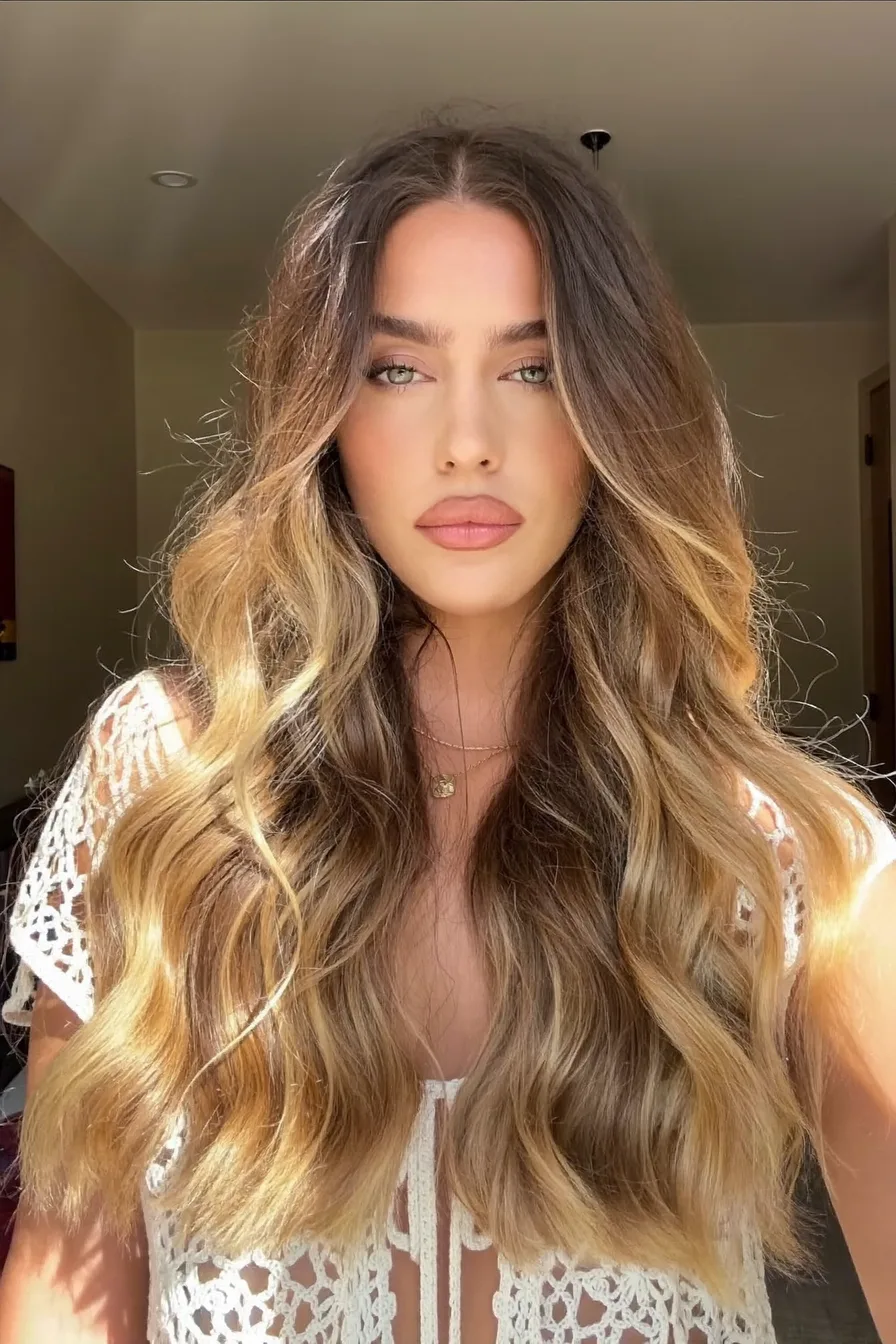 Voluminous Long Layers with Honey Blonde Balayage Highlights