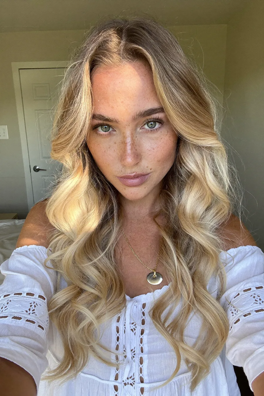 Voluminous Long Layers with Honey Blonde Balayage Highlights