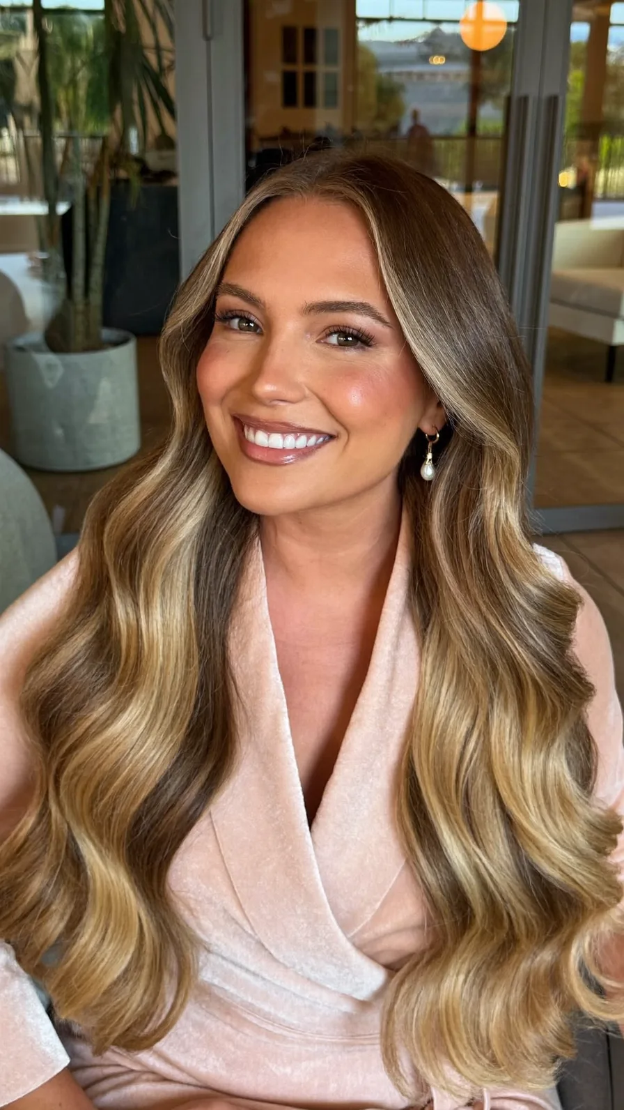 Long Flowing Waves with Warm Honey Blonde Low Lights