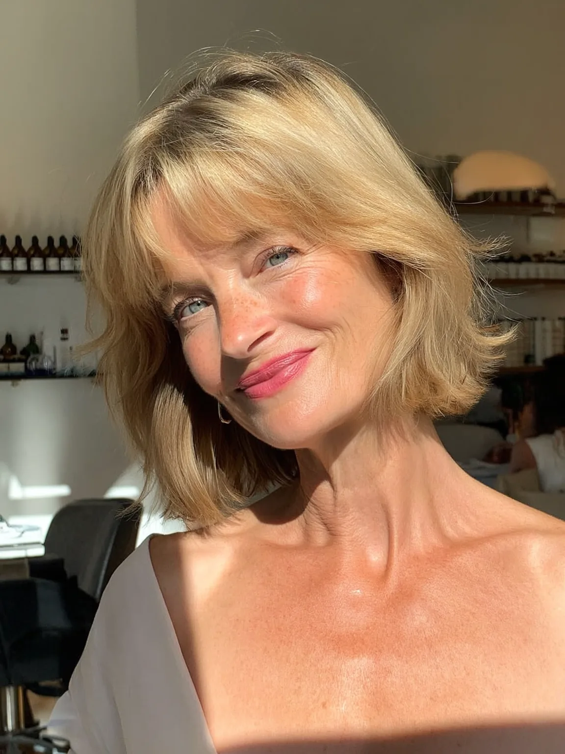 Wavy Sandy Blonde Bob with Curtain Bangs