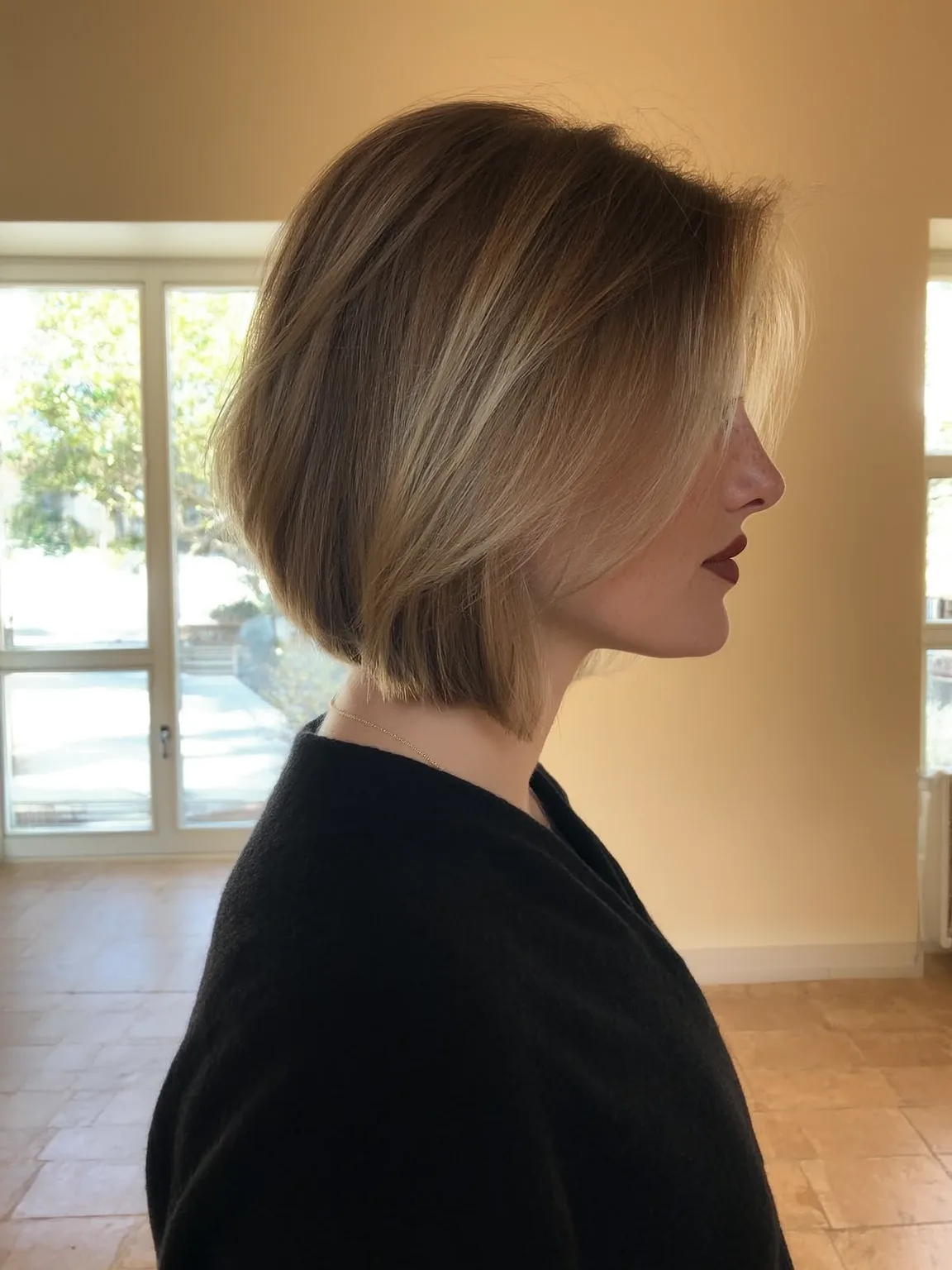 Chin-Length Natural Sheen Bob with Soft Sandy Blonde Balayage