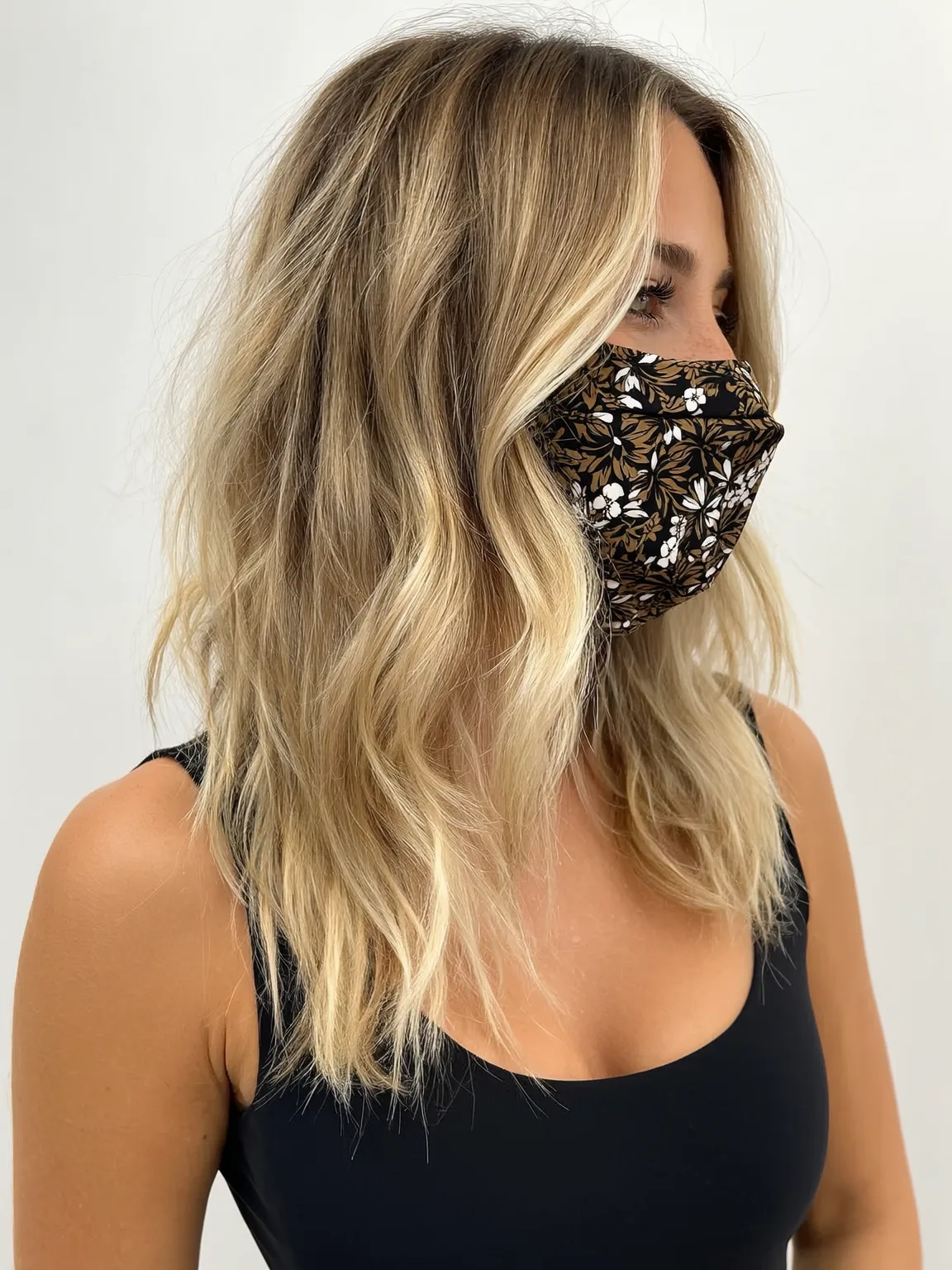 sandy blonde with sun-kissed highlights lob