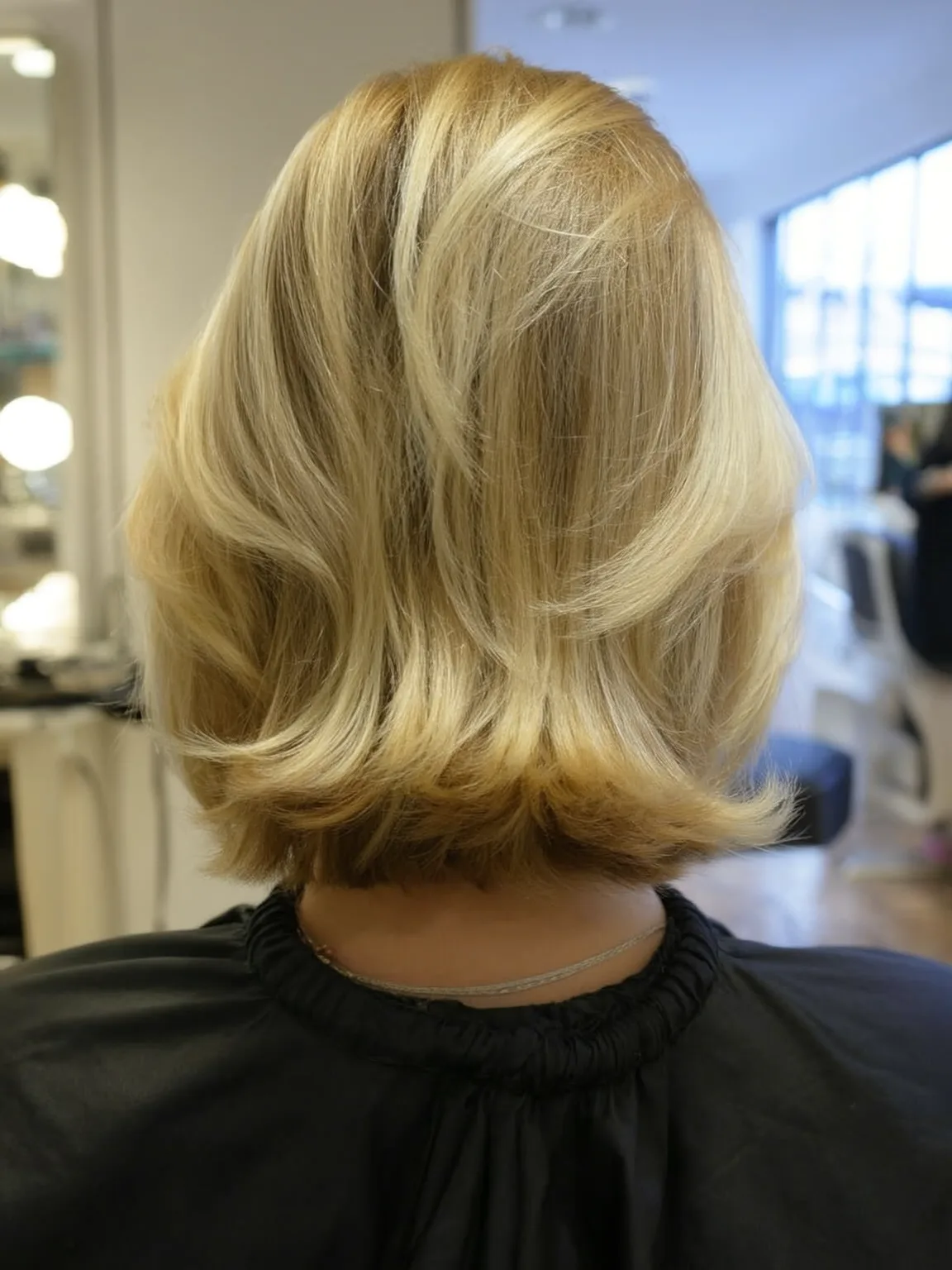 Chin-Length Wavy Bob with Sandy Blonde Texture