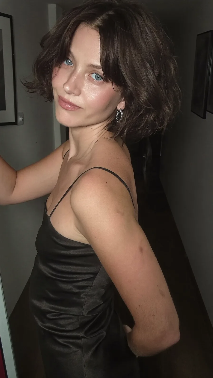 Textured Chin-Length Bob with Curtain Bangs and Natural Waves