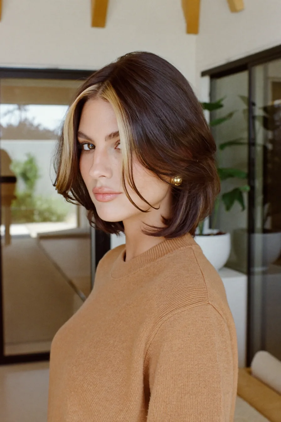 Chic Chin-Length Bob with Honey Blonde Curtain Highlights