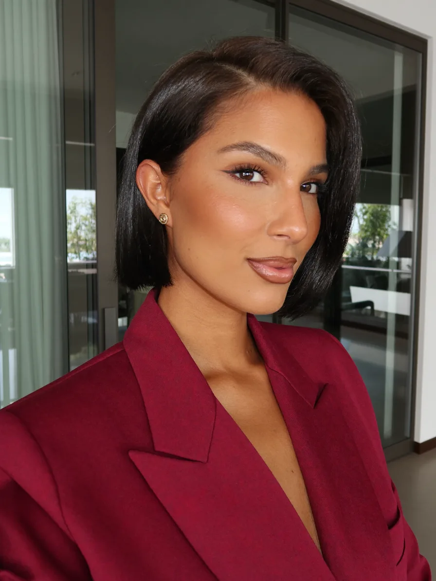 Sleek Blunt Bob with Deep Side Part for Elegant Appeal