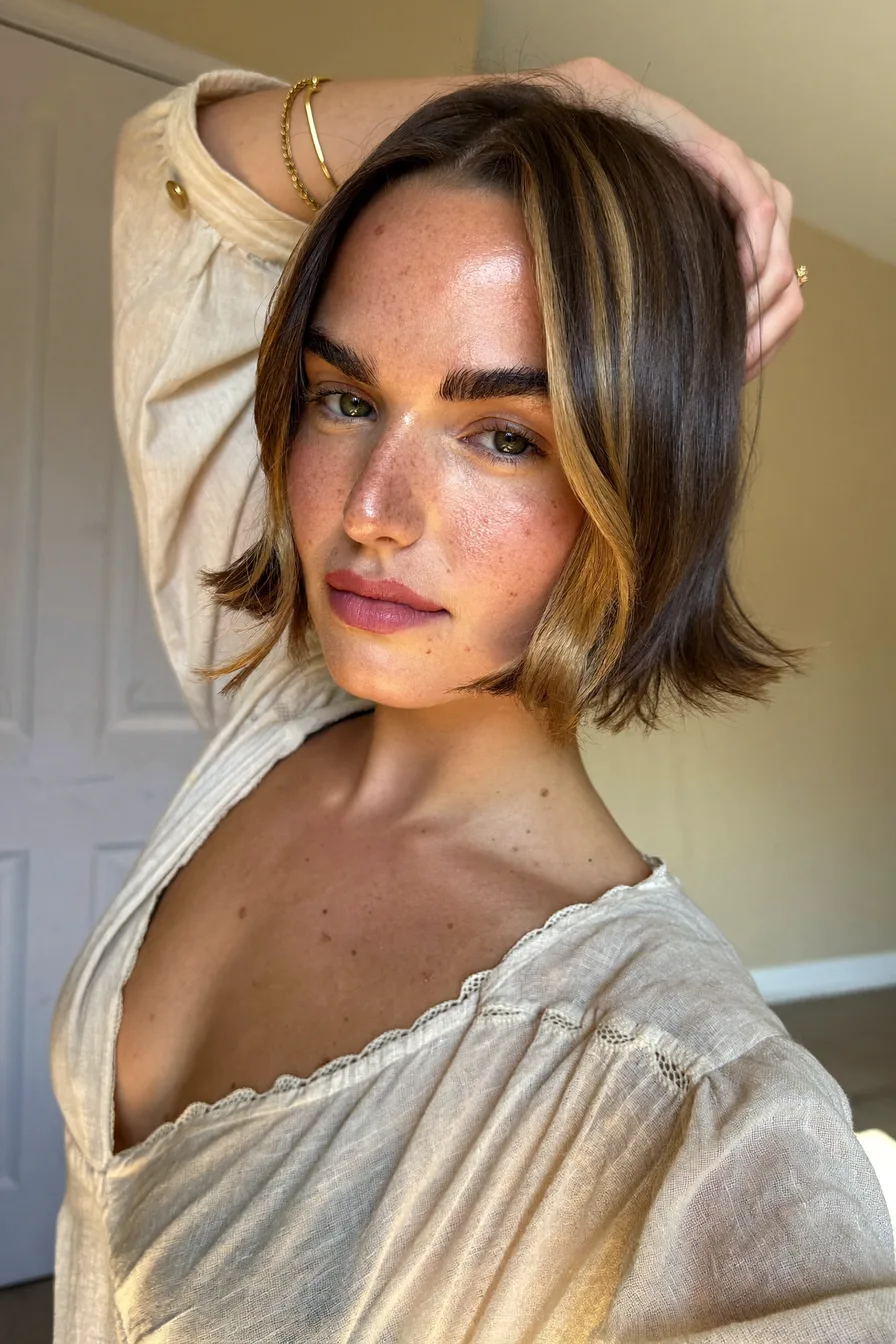 Chin-Length Blunt Bob with Flicked Ends and Money-Piece Highlights