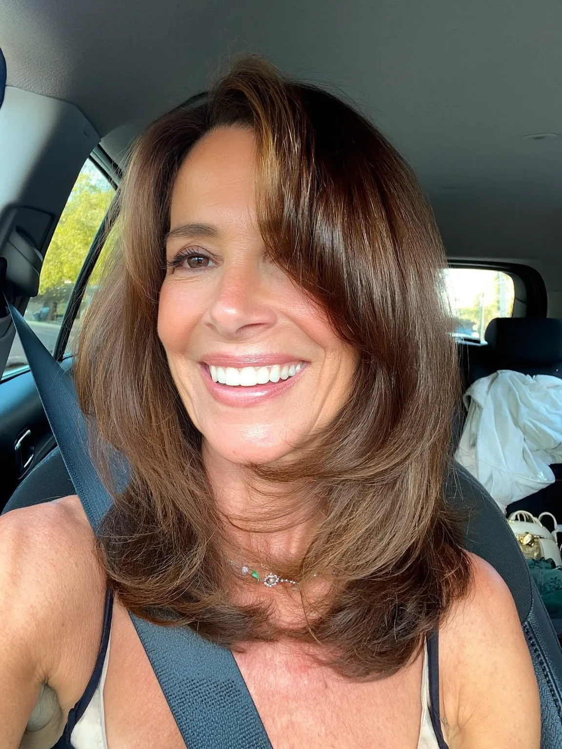 Shoulder-Length Straight Layers with Side-Swept Bangs in Chocolate