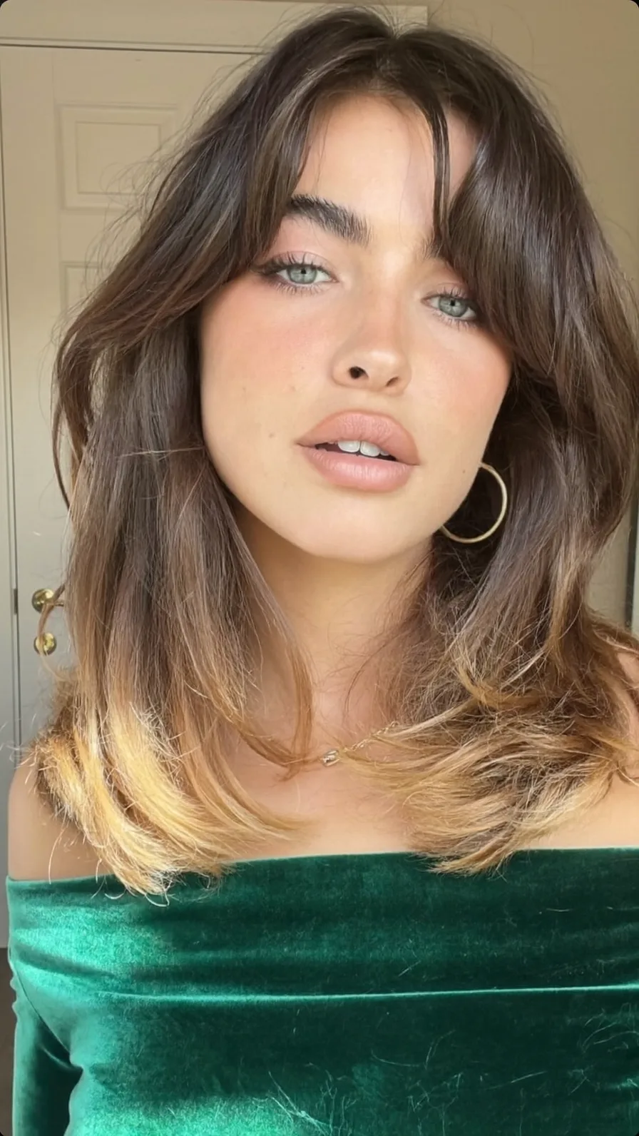 Shoulder-Length Long Layers with Warm Caramel Balayage and Curtain Bangs