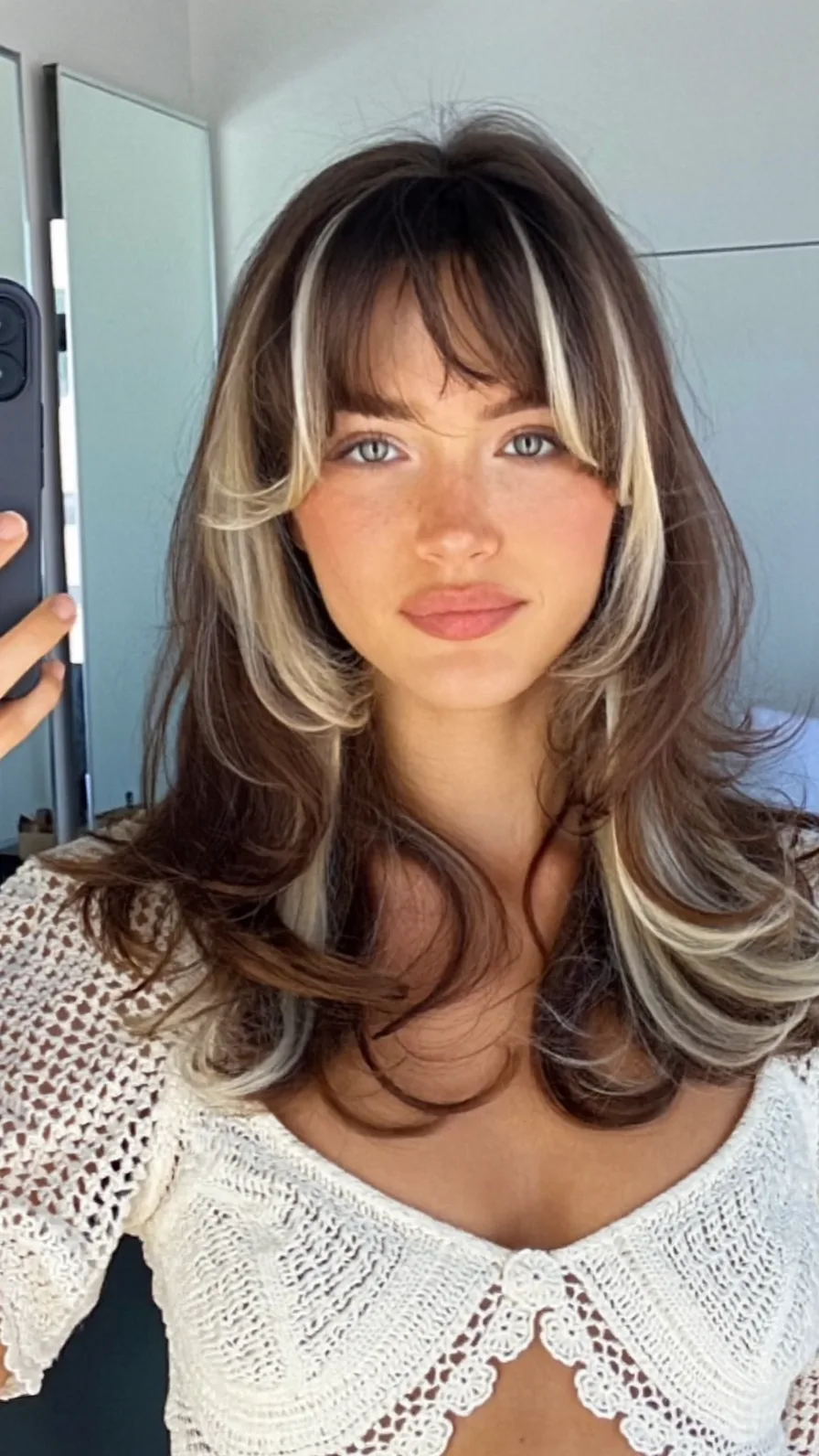 Modern Feathered Shoulder-Length Hair with Platinum Money-Piece Highlights