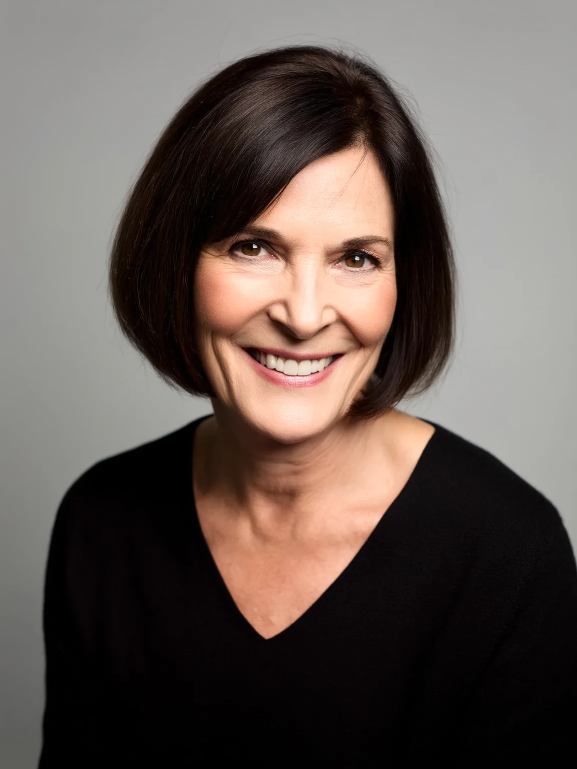 Chin-Length Straight Bob with Side-Swept Bangs