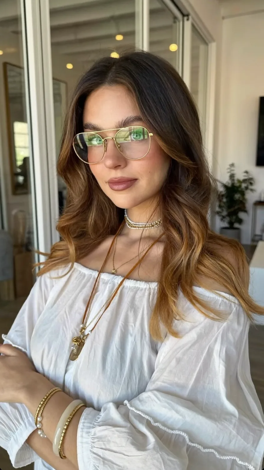 Modern Long Layered Waves with Balayage and Curtain Bangs