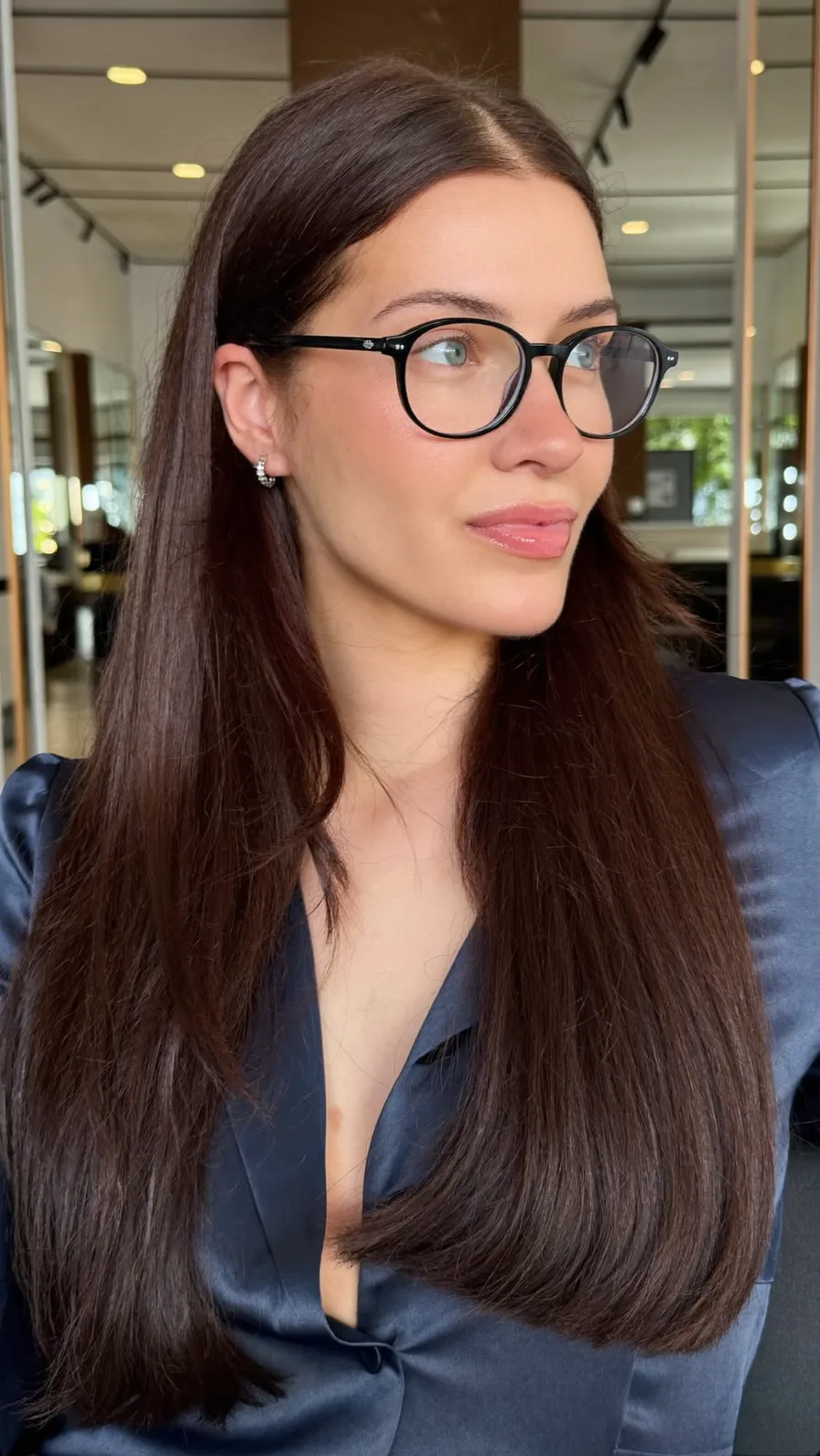 Sleek Long Layers with Center Part and Blunt Ends