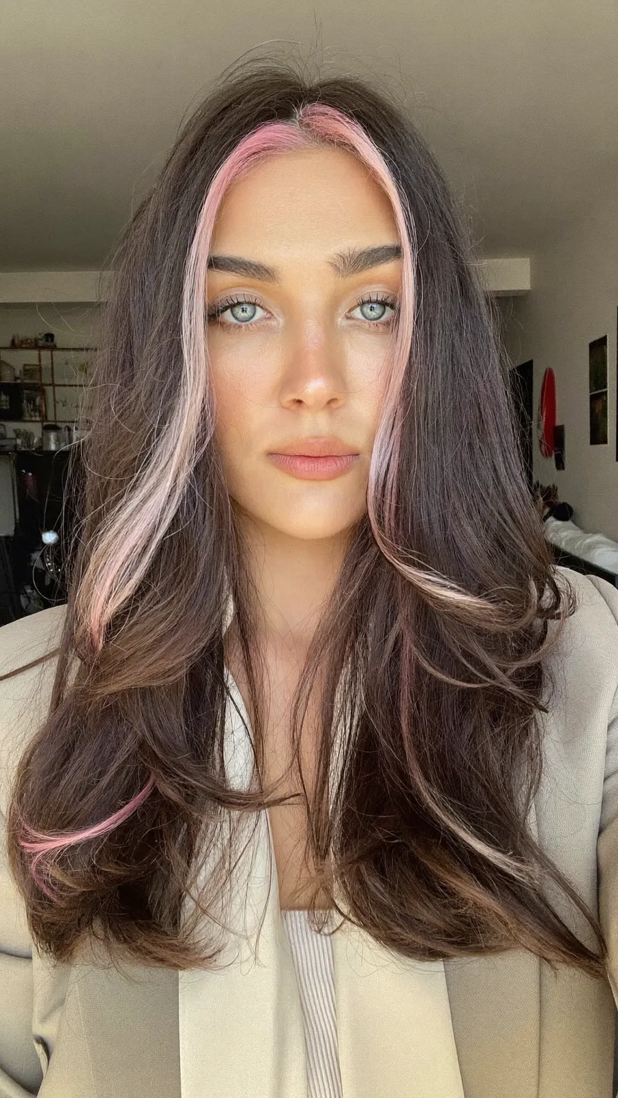 Long Layered Waves with Pastel Pink Money Piece Highlights