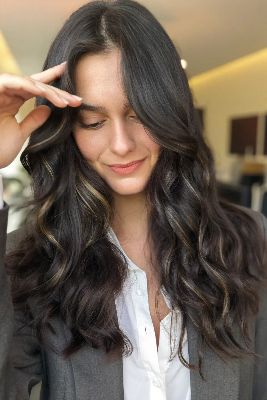 Flowing Long Layers with Wavy Curtain Bangs and Babylights
