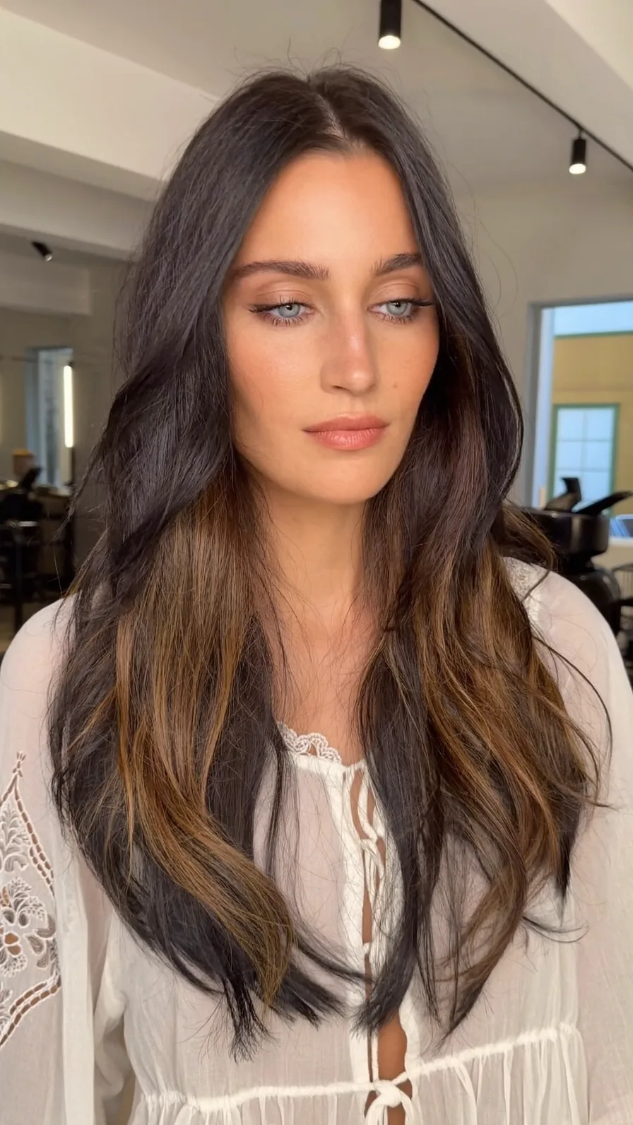 Soft Layered Long Wavy Hair with Caramel Balayage Highlights