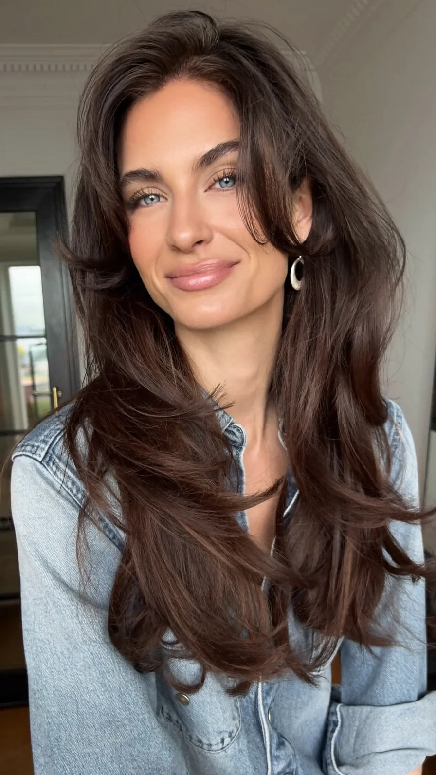Voluminous Long Layered Hair with Flowing Curtain Bangs