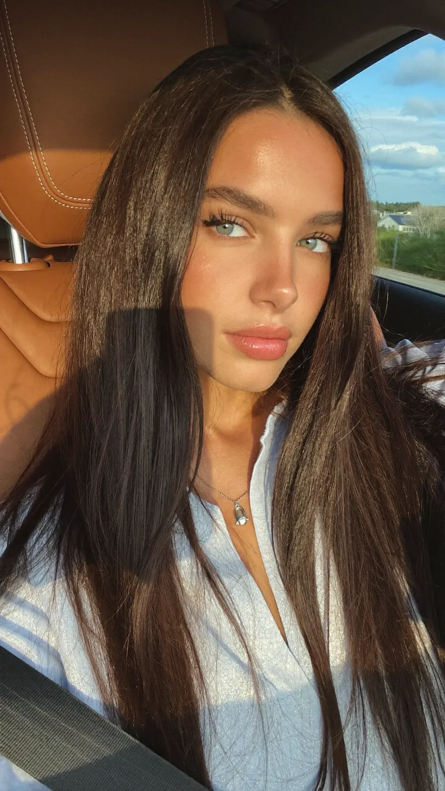 Sleek Long Layers with Center Part and Blunt Ends