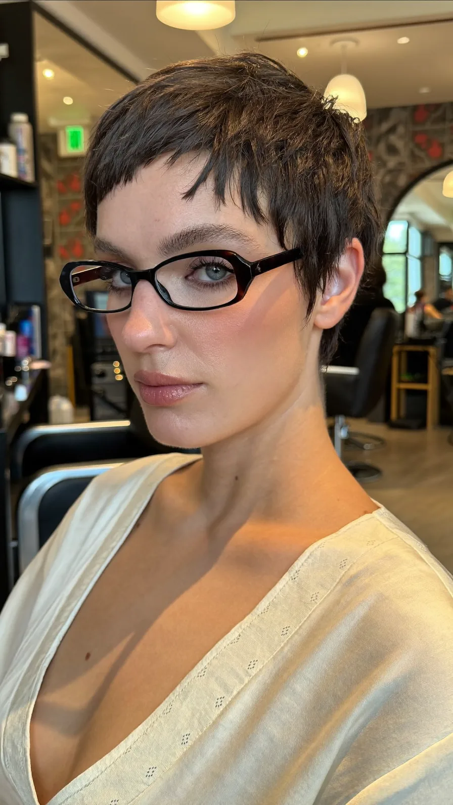 Modern Textured Pixie Cut with Micro Bangs and Choppy Layers