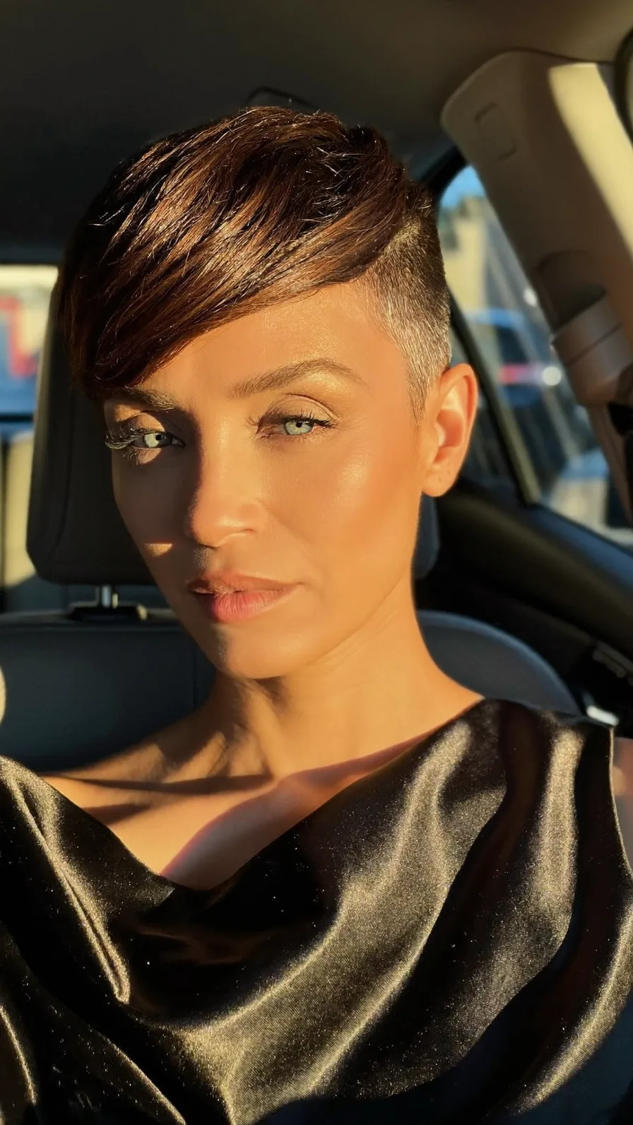 Sleek Side-Swept Pixie with Warm Highlighted Textures