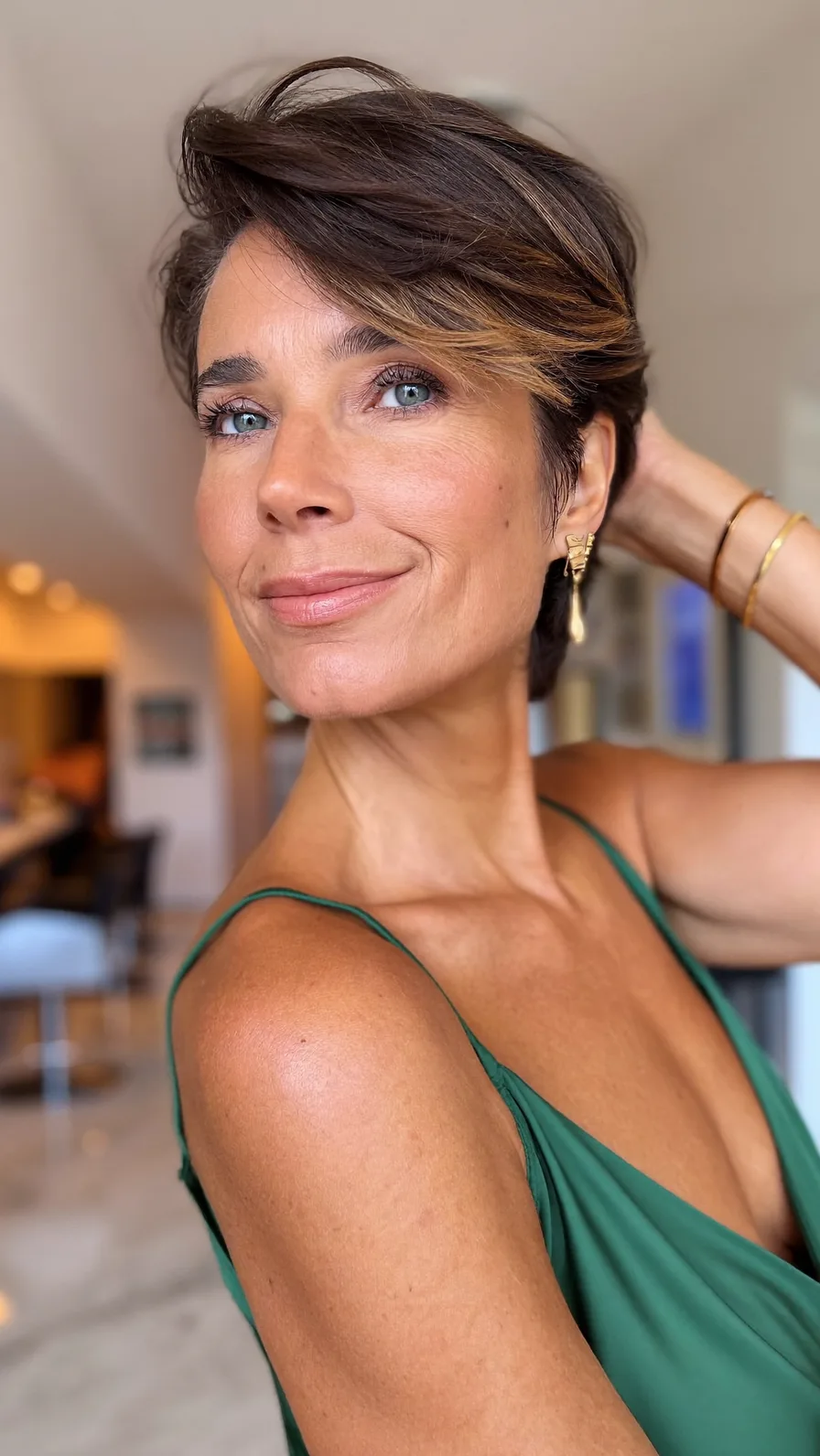 Voluminous Layered Pixie with Side-Swept Balayage Highlights