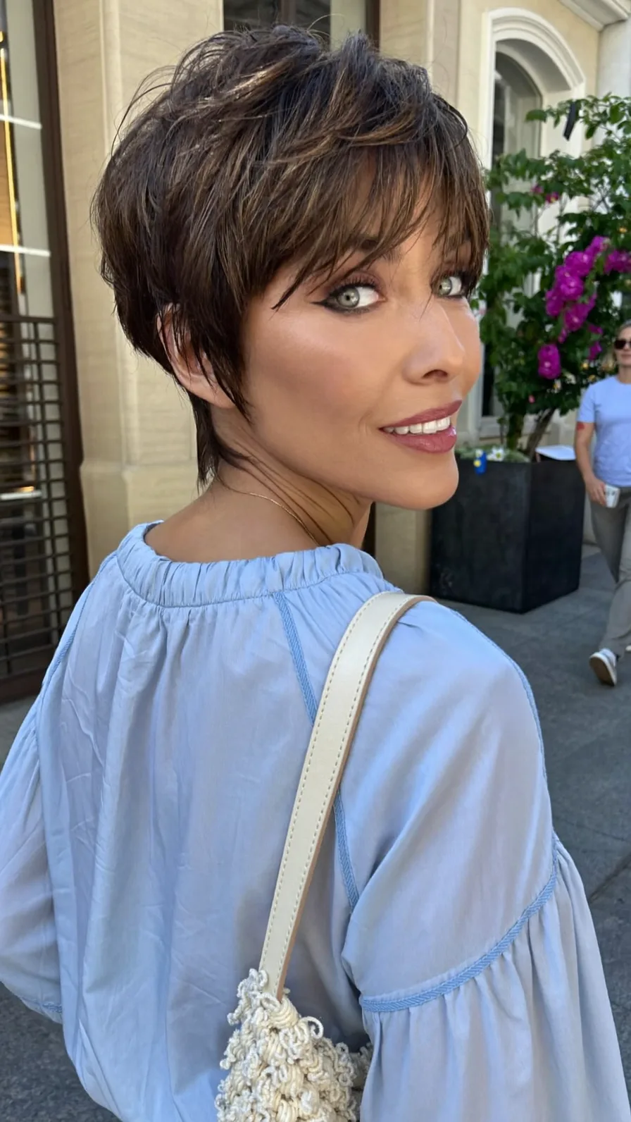 Textured Choppy Pixie Cut with Side Swept Highlights