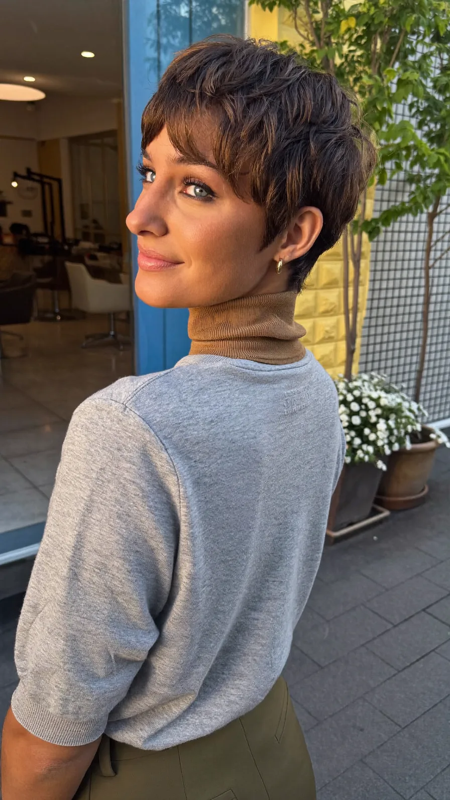 Modern Textured Pixie Cut with Side-Swept Caramel Highlights