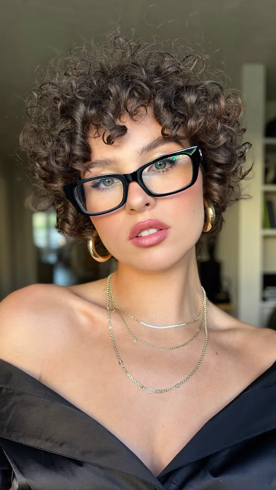 Voluminous Curly Pixie with Textured Choppy Layers