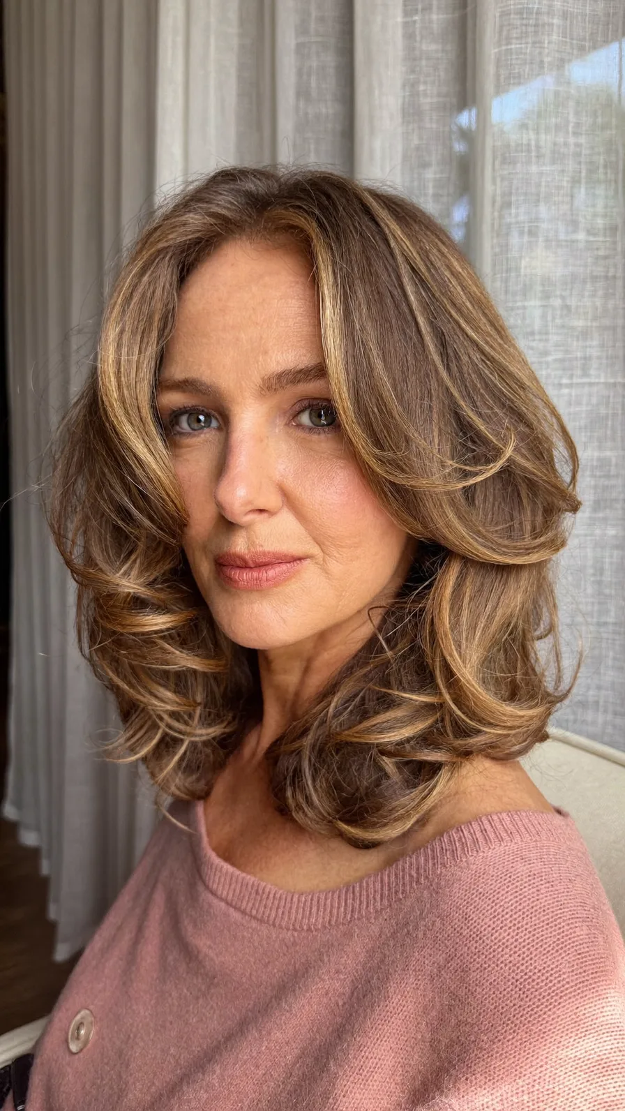 Voluminous Layered Medium Hair with Curtain Bangs and Balayage Highlights