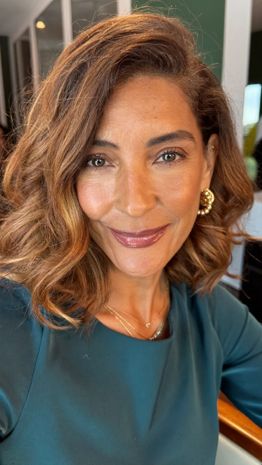 Elegant Medium-Length Warm Caramel Brown Wavy Layers