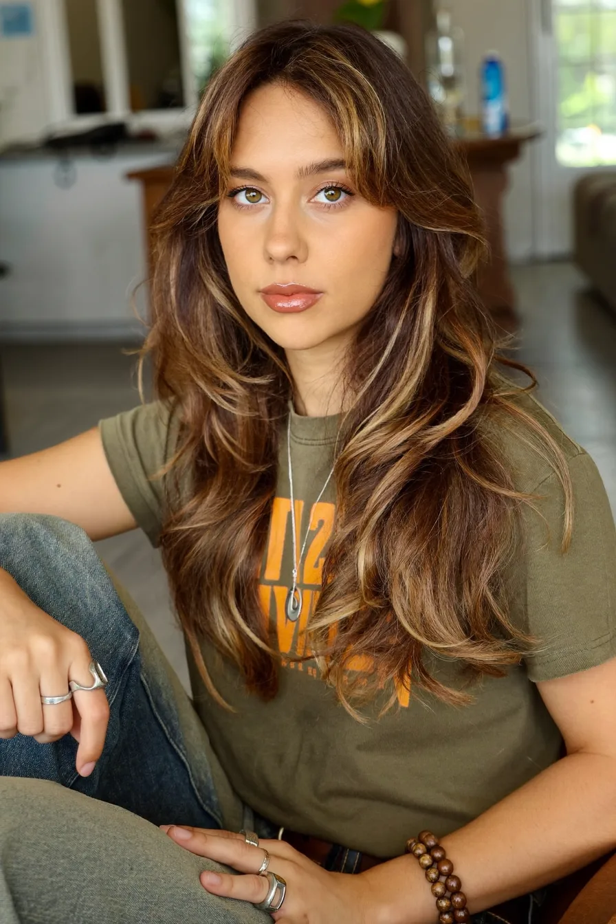 Face-Framing Balayage Brunette Wavy Long Layered Hairstyle