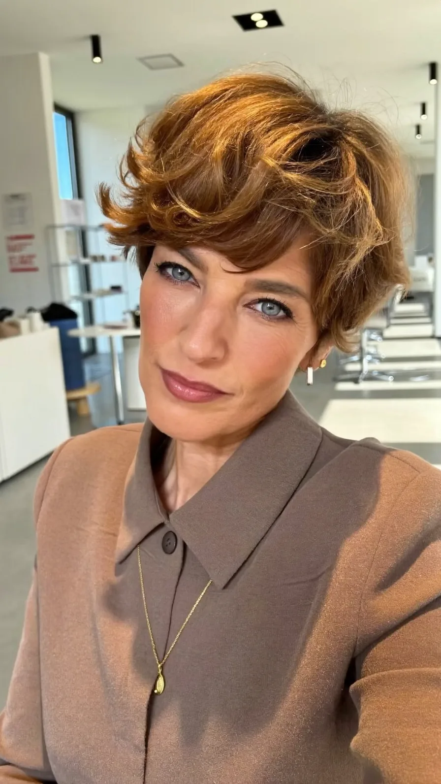 Voluminous Side-Swept Wavy Copper Layered Short Hair