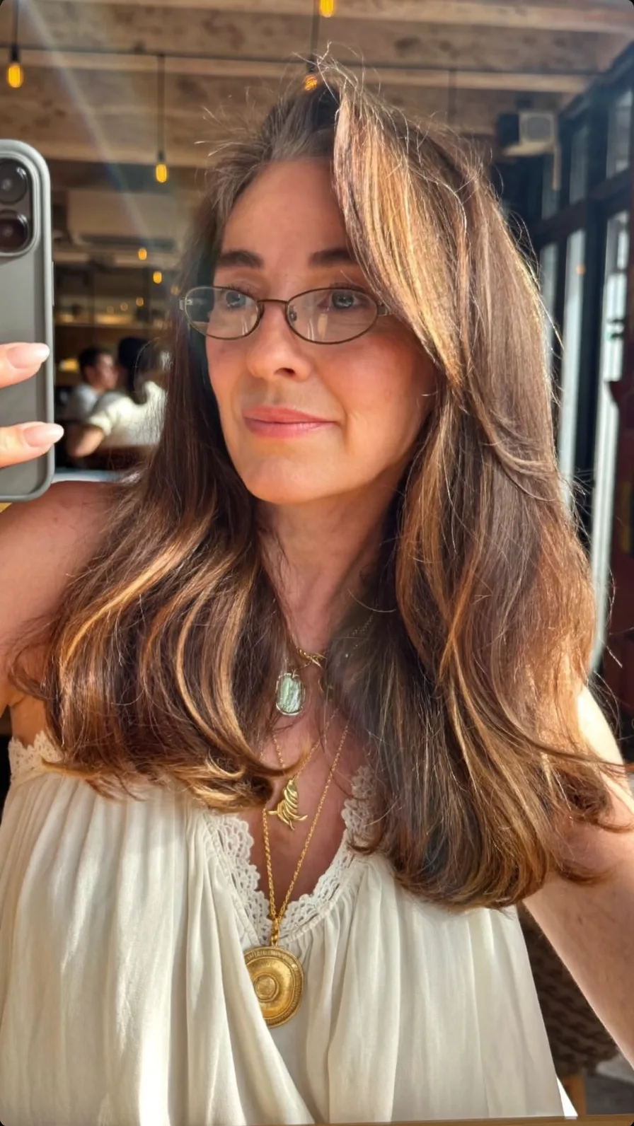 Classic Long Layered Hair with Soft Side-Swept Highlights
