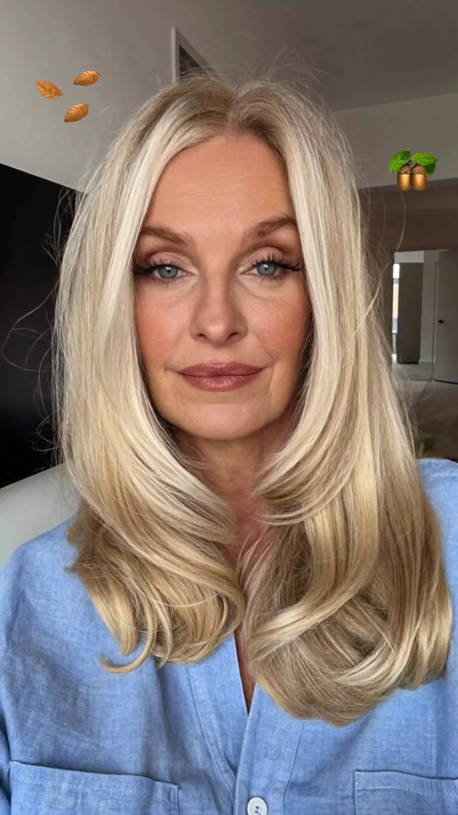 Classic Voluminous Long Layers with Center Part Blonde Style