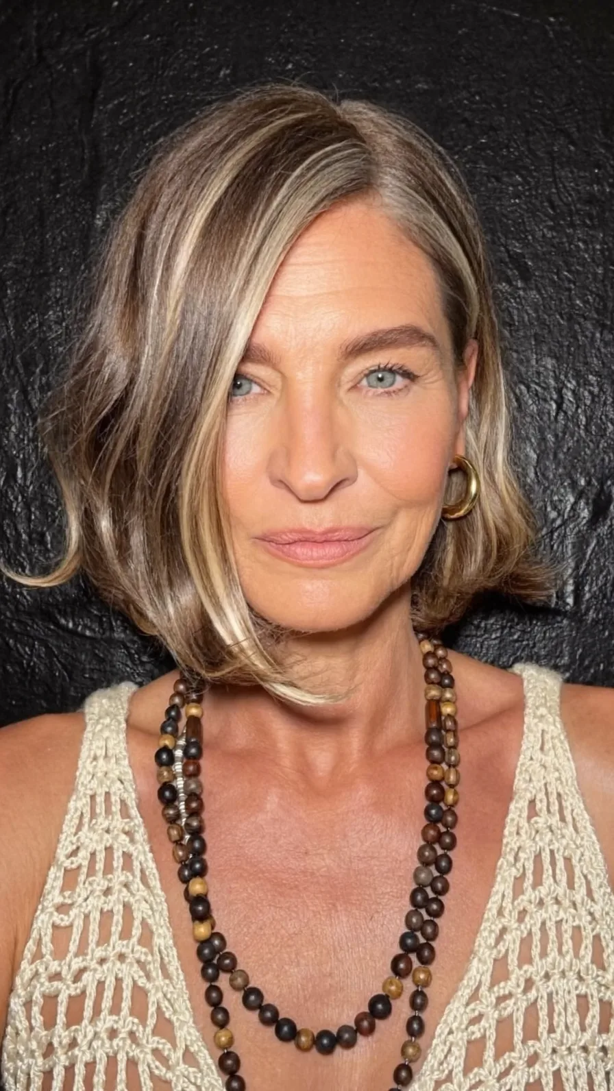 Chin-Length Wavy Bob with Ash Brown and Blonde Highlights