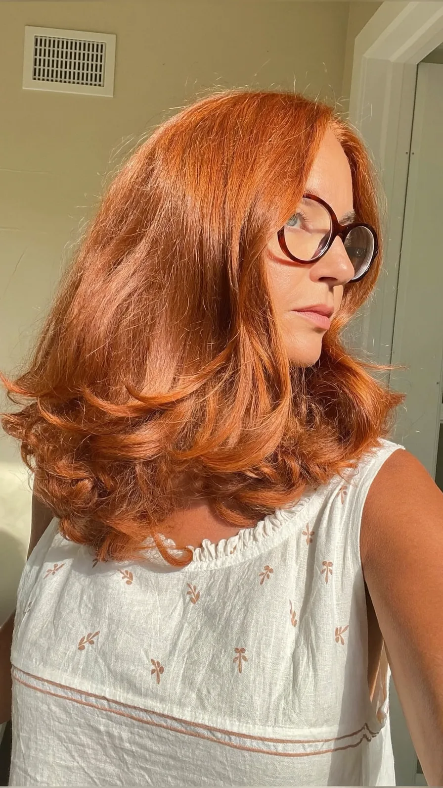 Soft Copper Red Shoulder-Length Hair with Flowing Long Layers