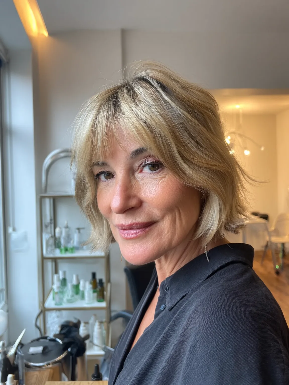 Chin-Length Bob with Sandy Blonde and Wispy Bangs